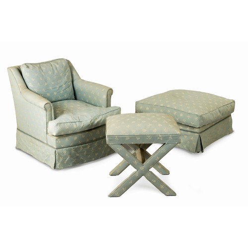 52 - AN UPHOLSTERED ARMCHAIR