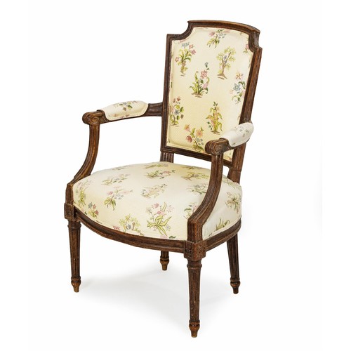 59 - A MAHOGANY AND UPHOLSTERED ARMCHAIR