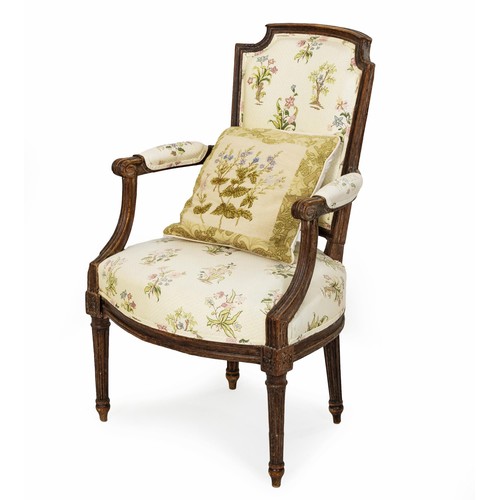 59 - A MAHOGANY AND UPHOLSTERED ARMCHAIR