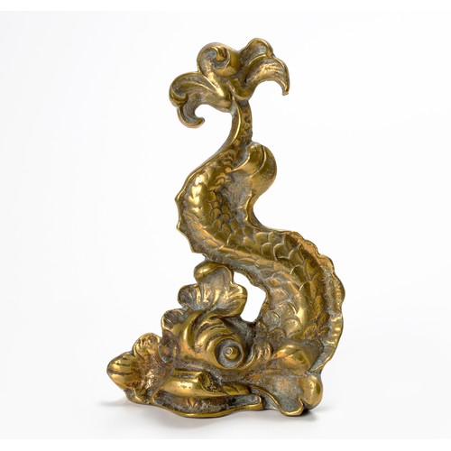 157 - A BRASS DOORSTOP IN THE FORM OF A DOLPHIN, 19TH CENTURY