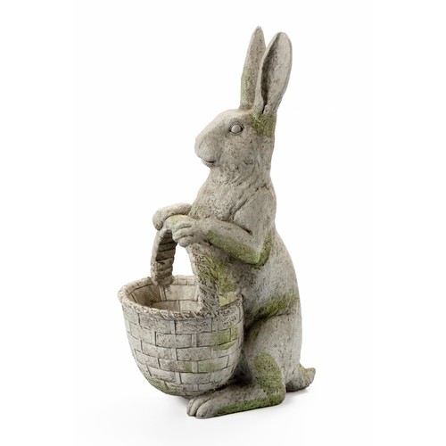 199 - AN ORNAMENTAL FIGURE OF A RABBIT WITH A BASKET