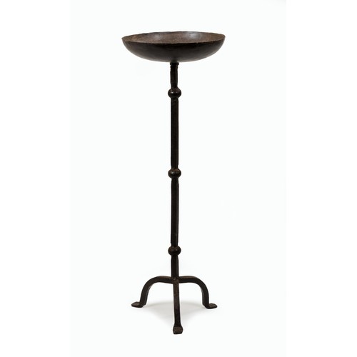 201 - A WROUGHT-IRON CANDLE HOLDER