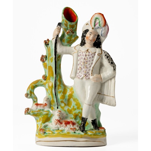 265 - A LARGE VICTORIAN STAFFORDSHIRE FIGURAL SPILLVASE OF A MAN WITH STAFF, TWO DOGS AT THIS FEET