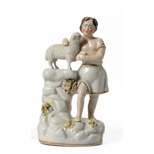 285 - A SMALL STAFFORDSHIRE FIGURE OF A BOY WITH A LAMB