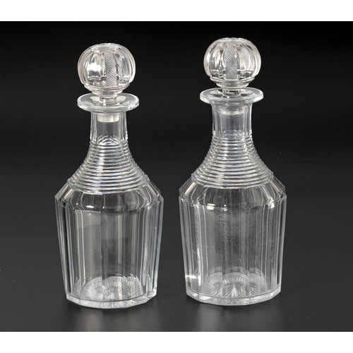 289 - A PAIR OF CUT-GLASS DECANTERS