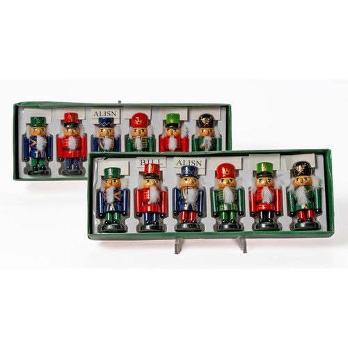 293 - A SET OF SIX WOOD 'NUTCRACKER' PLACECARD HOLDERS