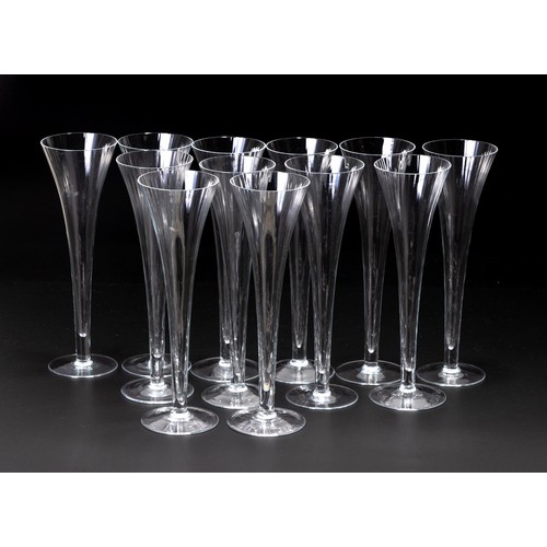 339 - A SET OF 12 FLUTED CHAMPAGNE FLUTES