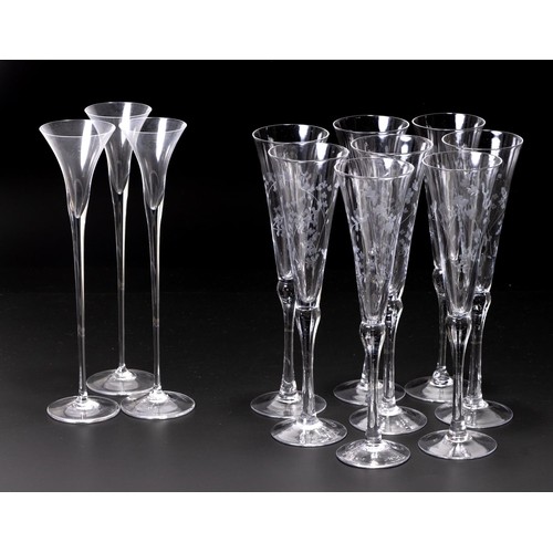 340 - A SET OF EIGHT CHAMPAGNE FLUTES