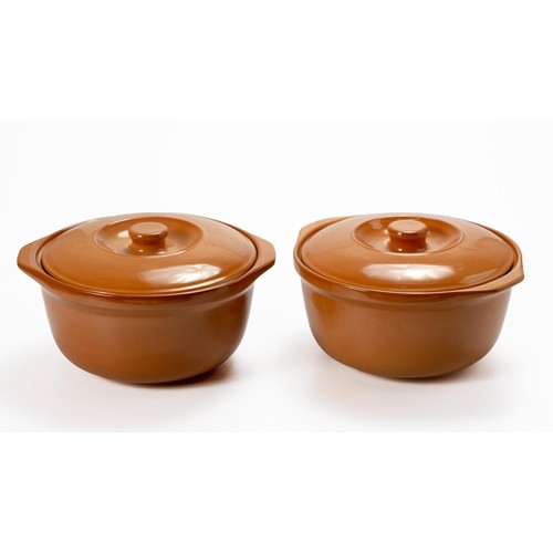 385 - A PAIR OF BROWN-GLAZED CERAMIC CASSEROLE DISHES AND COVERS