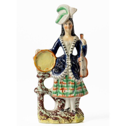 269 - A PAIR OF VICTORIAN STAFFORDSHIRE HIGHLANDER MUSICIANS