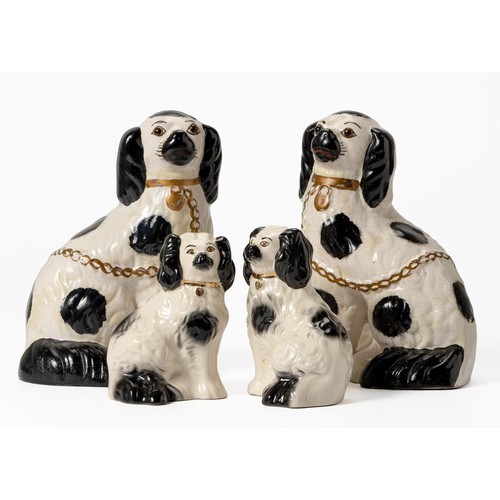 439 - TWO NEAR-PAIRS OF STAFFORDSHIRE DOGS