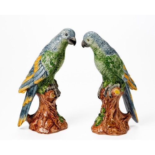 204 - A PAIR OF CERAMIC PARROTS