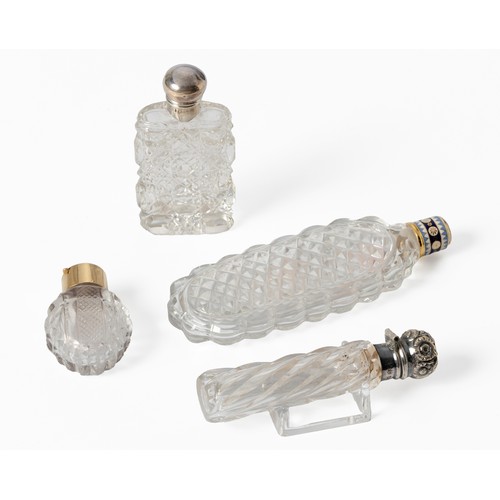 585 - TWO SILVER TOPPED SCENT BOTTLES, VARIOUS MAKERS AND DATES