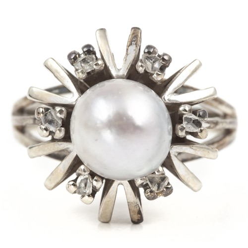 33 - A PEARL AND DIAMOND DRESS RING