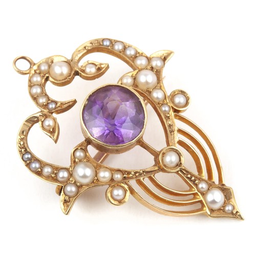 45 - AN AMETHYST AND PEARL BROOCH