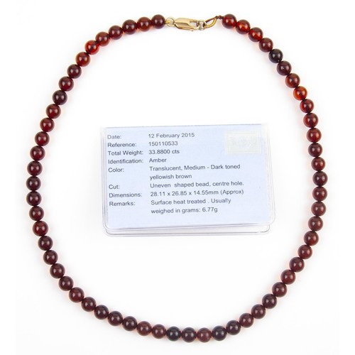 79 - AN EGL CERTIFIED AMBER NECKLACE, 33,88 CARATS