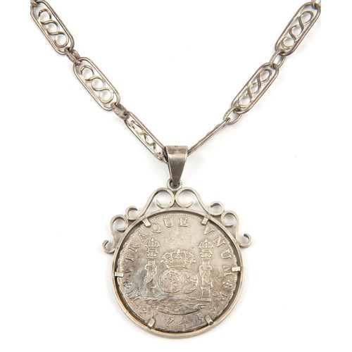 96 - A SILVER COIN PENDANT