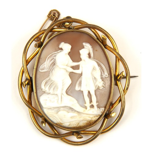 117 - A LARGE CAMEO BROOCHBezel set to the center in a twisted openwork 9ct yellow gold-plated frame , 7cm... 