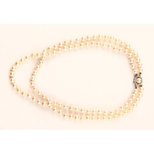 89 - A PEARL AND DIAMOND NECKLACE