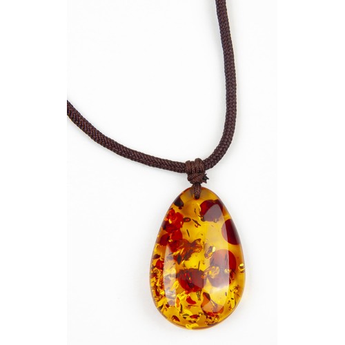 85 - AN EGL CERTIFIED AMBER PENDANT