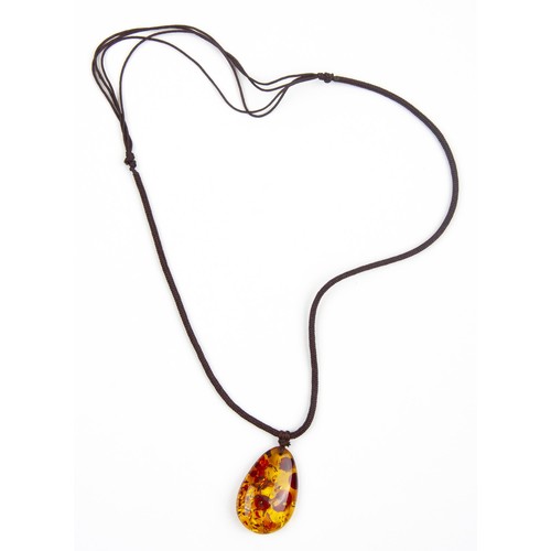 85 - AN EGL CERTIFIED AMBER PENDANT