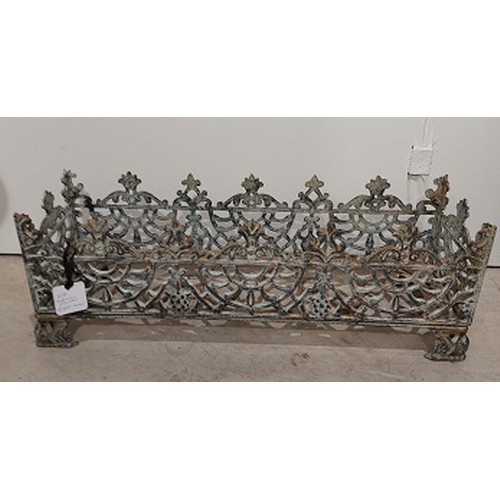 617 - A PATINATED CAST-IRON FILIGREE PLANTER