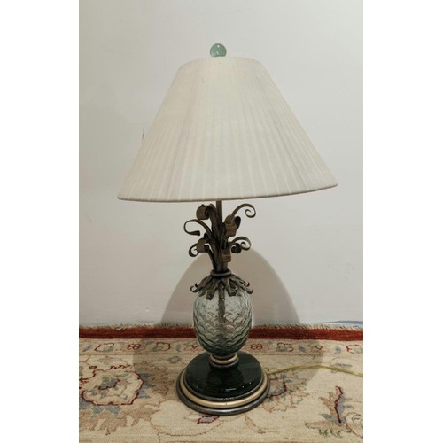 622 - A GLASS AND WROUGHT IRON TABLE LAMP