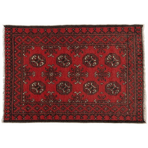 66 - AN AFGHAN RUG 108 by 76cm