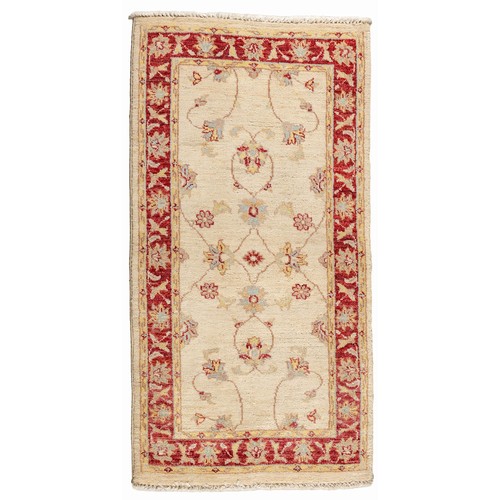 73 - A CHOBI RUG 138 by 69cm