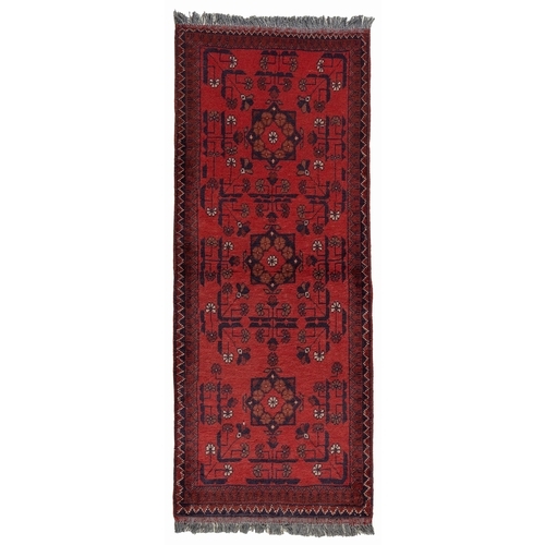 100 - AN AFGHAN KELIM RUNNER 143 by 55cm