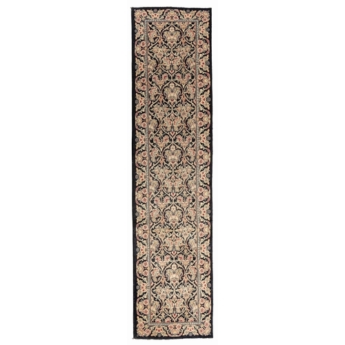 146 - A FINE SAROUCK RUNNER 320 by 76cm