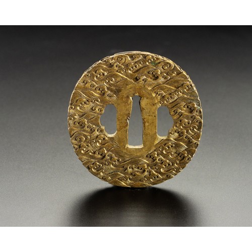 609 - A JAPANESE GILT METAL TSUBA, MEIJI PERIOD, 1868 - 1912