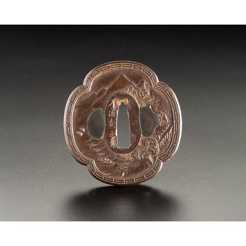 613 - A JAPANESE TSUBA, BY YAMICHI TOMOYUKE, EDO PERIOD, 1603 - 1868