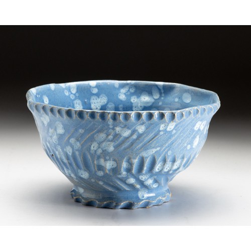 557 - A HANDBUILT PORCELAIN BOWL ATTRIBUTED TO HYLTON NEL