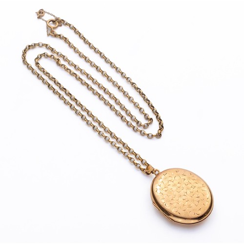 886 - A 9CT GOLD LOCKET