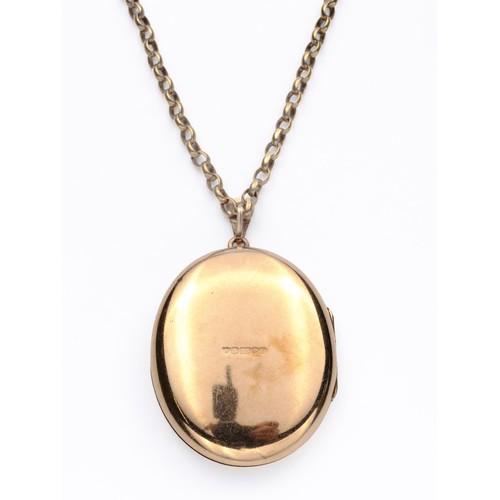 886 - A 9CT GOLD LOCKET