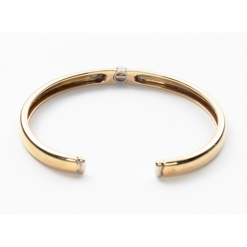 864 - A DIAMOND BANGLE