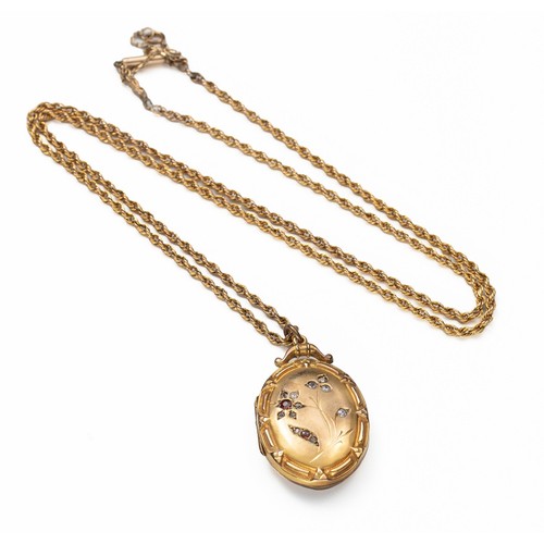 908 - A 9CT GOLD LOCKET