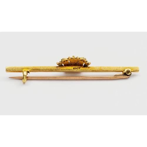 834 - A CASED ENAMELLED BAR BROOCH