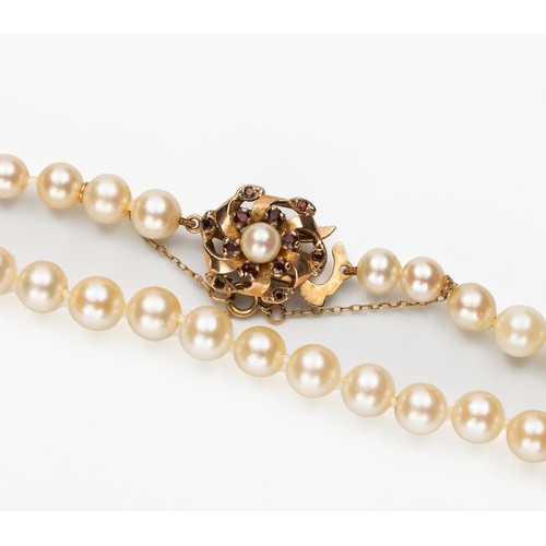 844 - AN OPERA-LENGTH PEARL NECKLACE