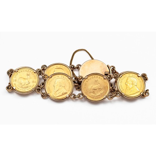 868 - A COIN-MOUNTED BRACELET