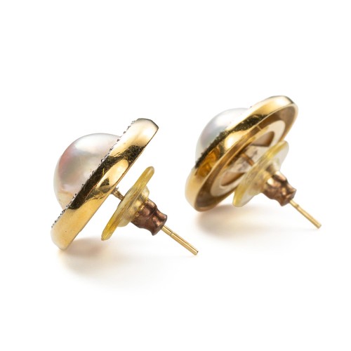 876 - A PAIR OF MABÉ PEARL AND DIAMOND EARRINGS