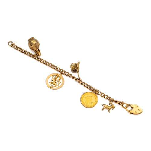 916 - A 9CT GOLD CHARM BRACELET