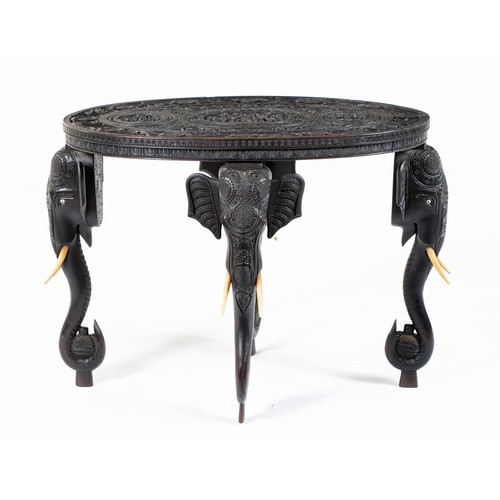 341 - AN ANGLO-INDIAN EBONY ELEPHANT TABLE