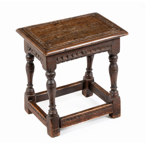 161 - AN OAK STOOL, EARLY 18TH CENTURY