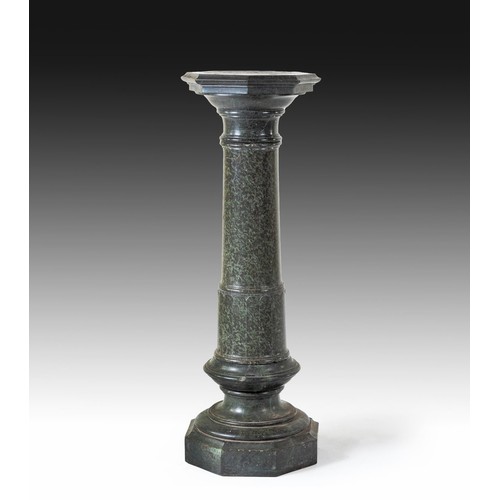 573 - A SERPENTNE MARBLE PEDESTAL PLINTH