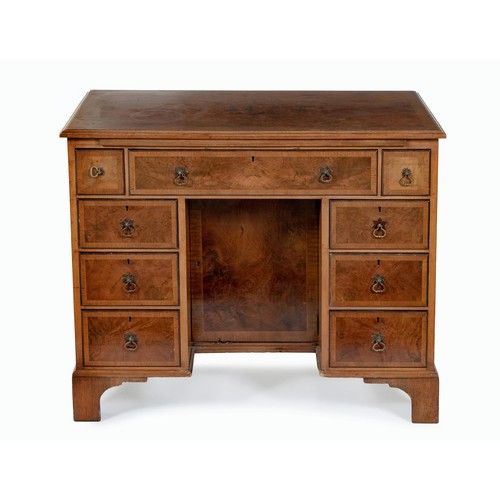 166 - A GEORGE III STYLE WALNUT KNEEHOLE DESK, 19TH CENTURY