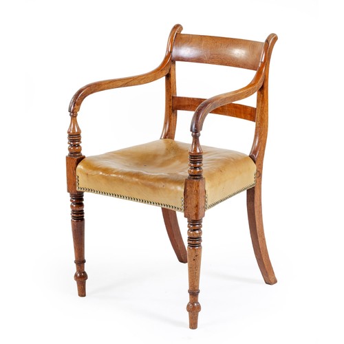 176 - A REGENCY WALNUT ARMCHAIR