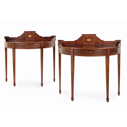 270 - A PAIR OF MAHOGANY DEMI LUNE TABLES