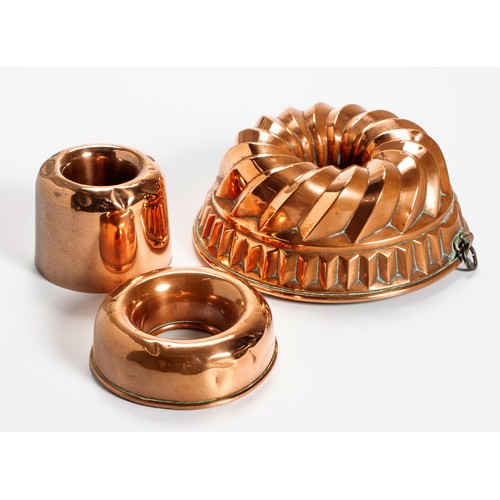 59 - THREE COPPER JELLY MOULDS